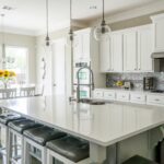 white kitchen with stainless steel appliances